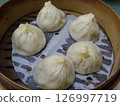 Xiaolongbao steamed in a bamboo steamer 126997719