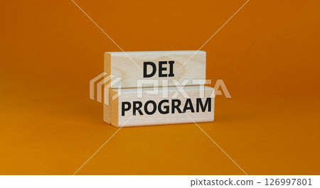 DEI diversity equity inclusion program symbol. Blocks with words DEI program on beautiful orange background. Business DEI diversity equity inclusion program concept. Copy space. 126997801