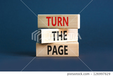Turn the page symbol. Concept words Turn the page on beautiful wooden block. Beautiful grey table grey background. Business motivational lifestyle turn the page concept. Copy space. 126997829