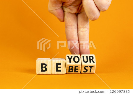 Motivational be your best symbol. Concept words Be your best on beautiful wooden block. Beautiful orange background Businessman hand. Business motivational be your best concept. Copy space. Motivational be your best symbol. Concept words Be your best on beautiful wooden block. Beautiful orange background Businessman hand. Business motivational be your best concept. Copy space. 126997885