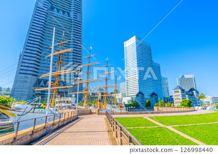 Yokohama cityscape in Japan, with views of the sailing ship Nippon Maru and Yokohama Landmark Tower Yokohama cityscape in Japan, with views of the sailing ship Nippon Maru and Yokohama Landmark Tower 126998440