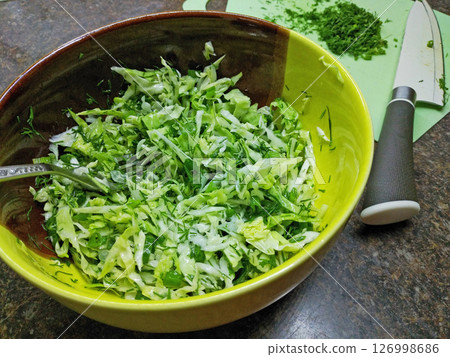 light salad of cabbage, cucumbers, green onions and dill light salad of cabbage, cucumbers, green onions and dill 126998686