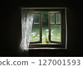 Springtime feeling with bird at farmhouse window 127001593