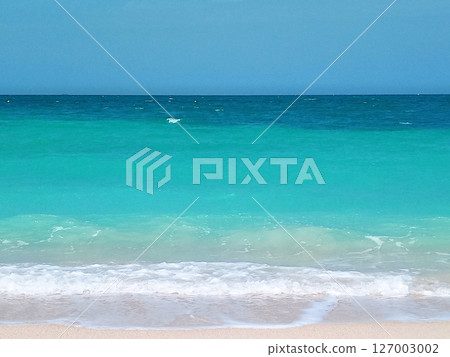 View of Sharjah s beautiful coastline, where soft, golden sands meet the calm, turquoise waters of the Arabian Gulf. View of Sharjah s beautiful coastline, where soft, golden sands meet the calm, turquoise waters of the Arabian Gulf. 127003002