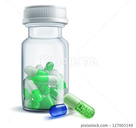 A bottle of pills with two capsules outside. A bottle of pills with two capsules outside. 127003149