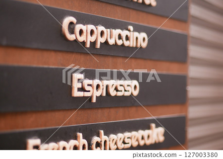 Coffee menu board featuring drinks and desserts Coffee menu board featuring drinks and desserts 127003380