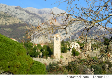 Picturesque view of Clock Tower in Old Town Bar (Stari Grad Bar) on the background of majestic Balkans mountains in Montenegro 127004188