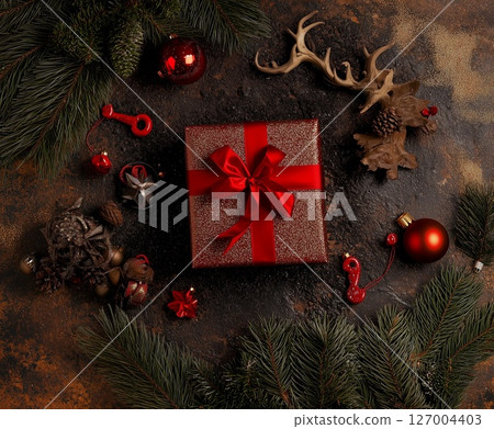Green Christmas background with fir branches and decorations. with copyspace 127004403