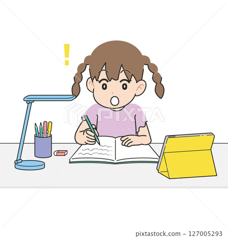 A girl studying at a desk while looking at a tablet. I got it. 127005293