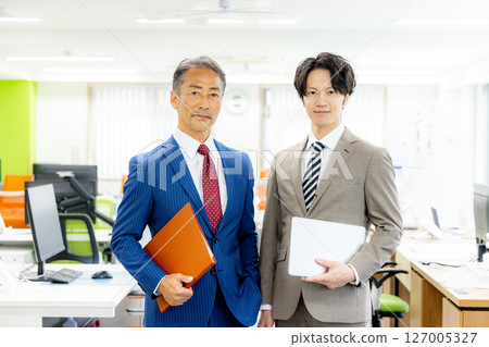Businessman with file Businessman with file 127005327