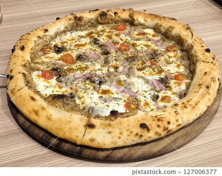 Delicious Pizza Topped with Ham and Vegetables Delicious Pizza Topped with Ham and Vegetables 127006377