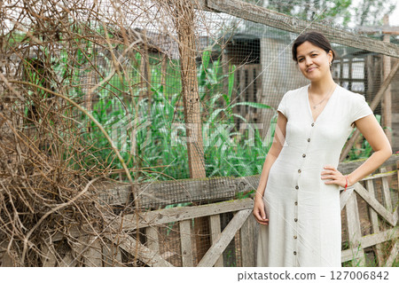 Asian woman at farm 127006842