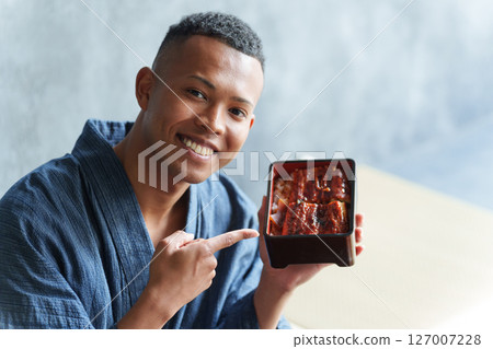 Foreign tourists eating Japanese food 127007228