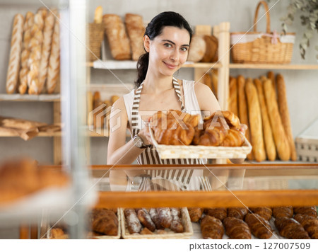 Armenian young woman work selling in family bakery shop 127007509