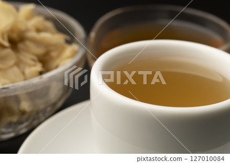 Warm ginger ale made with ginger syrup Warm ginger ale made with ginger syrup 127010084