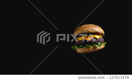 Great burger on a dark isolated phone 127011479