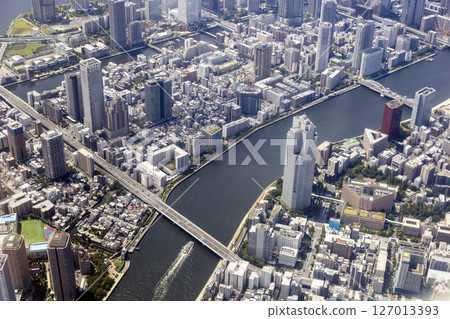 Aerial view of Tsukishima from above Tsukuda Bridge in Tokyo 127013393