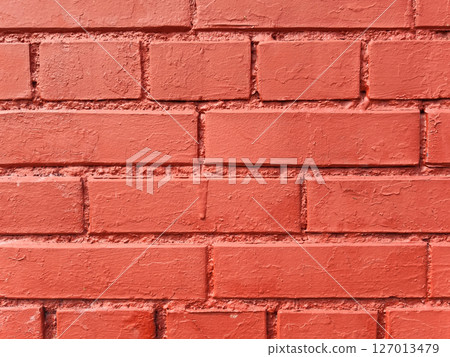 Textured brick wall made of red stone, painted brick. Rectangular background for mockups, paintings, posters. Textured brick wall made of red stone, painted brick. Rectangular background for mockups, paintings, posters. 127013479