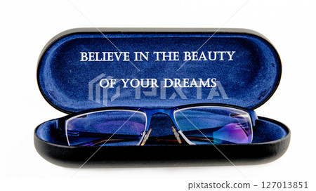 Business and Believe in your Dreams concept. Copy space. Concept words BELIEVE IN THE BEAUTY OF YOUR DREAMS Business and Believe in your Dreams concept. Copy space. Concept words BELIEVE IN THE BEAUTY OF YOUR DREAMS 127013851