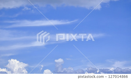 Blue sky with voluminous fluffy clouds. Thunderstorm over the river. Blue sky with voluminous fluffy clouds. Thunderstorm over the river. 127014866