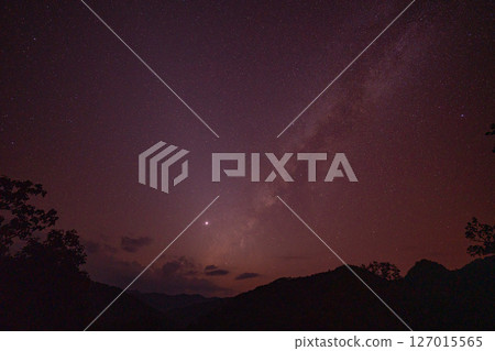 The Milky Way above mountain is beautifully clustered. The Milky Way above mountain is beautifully clustered. 127015565