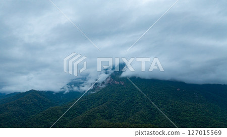 Aerial view of Cloud-Covered Mountain Peak 127015569