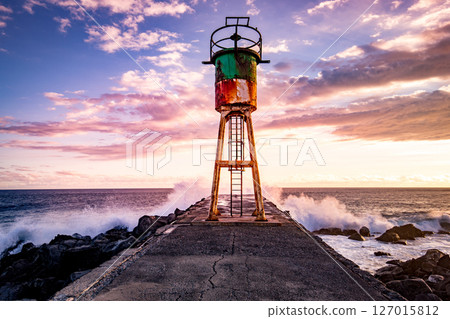 Jetty and lighthouse in Saint-Pierre, La Reunion island 127015812