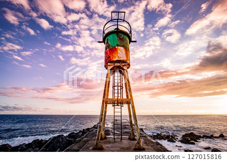 Jetty and lighthouse in Saint-Pierre, La Reunion island 127015816