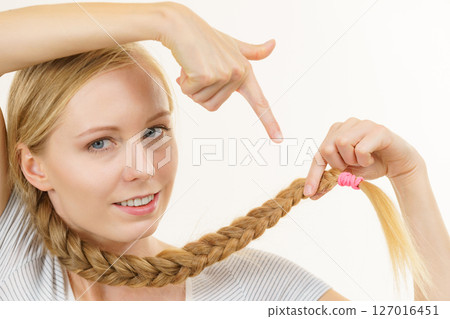 Blonde girl with braid hair Blonde girl with braid hair 127016451