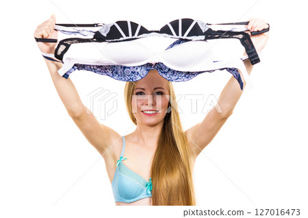 Woman choosing bra to wear 127016473