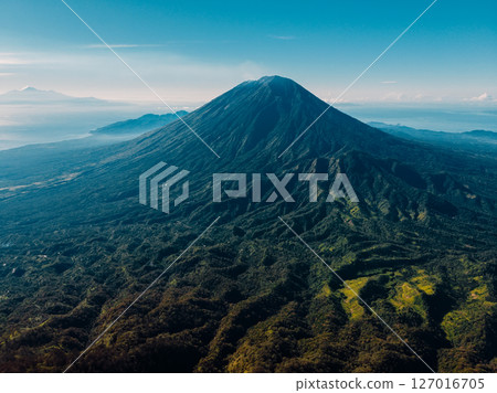Above drone view of Agung volcano and scenic mountain landscape in Bali 127016705
