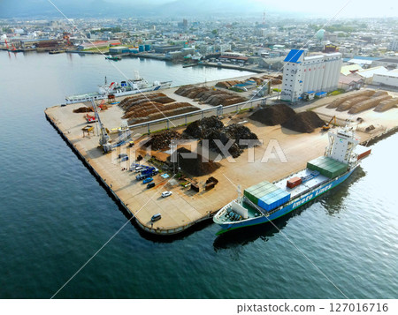 Aerial view of cargo ships docking at the pier of Hakodate Port in Hakodate, Hokkaido in early summer Aerial view of cargo ships docking at the pier of Hakodate Port in Hakodate, Hokkaido in early summer 127016716
