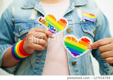 Asian woman with rainbow flag, LGBT symbol rights and gender equality, LGBT Pride Month in June. 127016789