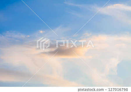 A blue sky with soft clouds. 127016798