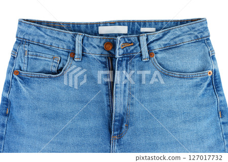 Front side of blue jeans pants. Design details, metal button, waistband, pocket and small pocket Front side of blue jeans pants. Design details, metal button, waistband, pocket and small pocket 127017732