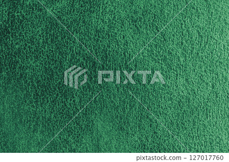 Close up, macro structure of green suede fabric with abstract embossed shabby, messy texture. 127017760