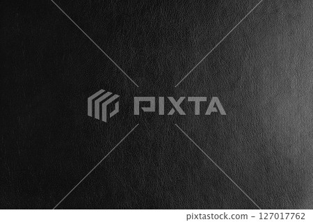 Glossy structure black genuine leather with gradient lighting effect, leatharette texture 127017762