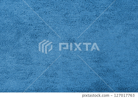 Structure of blue suede fabric with abstract shabby texture with shades closeup, macro. 127017763