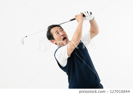 Middle-aged man golfing making a mistake shot 127018844