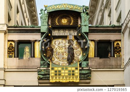 Anker Clock (Ankeruhr), an ornate art nouveau clock in Vienna, Austria. Gilded details, historical figures Anker Clock (Ankeruhr), an ornate art nouveau clock in Vienna, Austria. Gilded details, historical figures 127019365