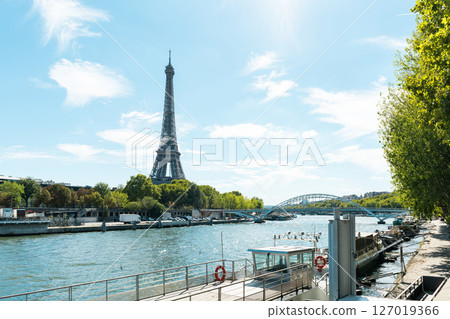 Eiffel Tower and Seine river in Paris on a bright sunny day 127019366