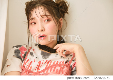 A young woman dressed in pop fashion A young woman dressed in pop fashion 127020230