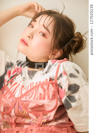 A young woman dressed in pop fashion A young woman dressed in pop fashion 127020236