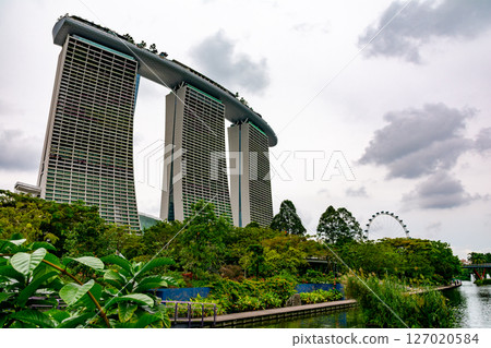 SINGAPORE - April 8 2025: View of Gardens by the Bay and Marina Bay Sands in Singapore SINGAPORE - April 8 2025: View of Gardens by the Bay and Marina Bay Sands in Singapore 127020584