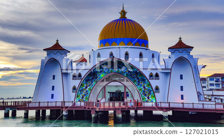 Bandar Melaka, Malaysia- April 16 2025.Masjid Selat Melaka is a landmark for tourist spot in Malacca.A landmark that attracts people to view the architecture landscape.The mosque is built on the sea. 127021015