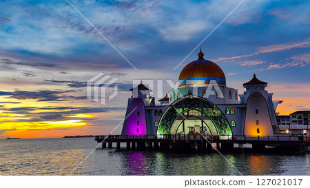 Bandar Melaka, Malaysia- April 16 2025.Masjid Selat Melaka is a landmark for tourist spot in Malacca.A landmark that attracts people to view the architecture landscape.The mosque is built on the sea. Bandar Melaka, Malaysia- April 16 2025.Masjid Selat Melaka is a landmark for tourist spot in Malacca.A landmark that attracts people to view the architecture landscape.The mosque is built on the sea. 127021017