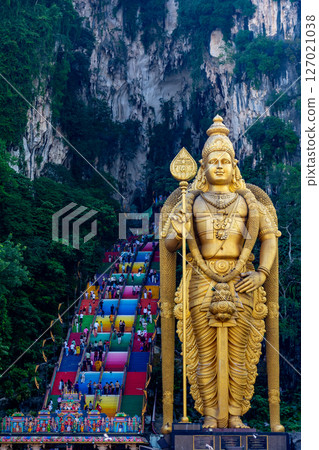 Gombak, Selangor Malaysia: April 18 2025: Batu Caves and the Murugan statue (The Hindu god of war ) also known as Kartikeya , Skanda, Subrahmanya and Shanmukha. Gombak, Selangor Malaysia: April 18 2025: Batu Caves and the Murugan statue (The Hindu god of war ) also known as Kartikeya , Skanda, Subrahmanya and Shanmukha. 127021038