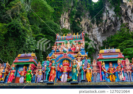 Gombak, Selangor Malaysia: April 18 2025: Batu Caves and the Murugan statue (The Hindu god of war ) also known as Kartikeya , Skanda, Subrahmanya and Shanmukha. Gombak, Selangor Malaysia: April 18 2025: Batu Caves and the Murugan statue (The Hindu god of war ) also known as Kartikeya , Skanda, Subrahmanya and Shanmukha. 127021064
