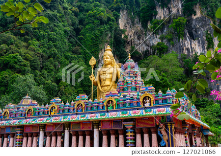 Gombak, Selangor Malaysia: April 18 2025: Batu Caves and the Murugan statue (The Hindu god of war ) also known as Kartikeya , Skanda, Subrahmanya and Shanmukha. Gombak, Selangor Malaysia: April 18 2025: Batu Caves and the Murugan statue (The Hindu god of war ) also known as Kartikeya , Skanda, Subrahmanya and Shanmukha. 127021066
