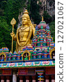 Gombak, Selangor Malaysia: April 18 2025: Batu Caves and the Murugan statue  (The Hindu god of war ) also known as Kartikeya , Skanda, Subrahmanya and Shanmukha. 127021067